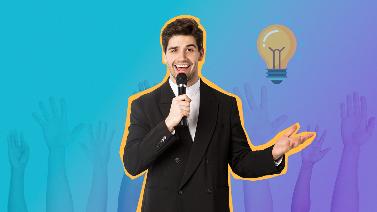 homem com microfone na mao e maos de publico no ar
